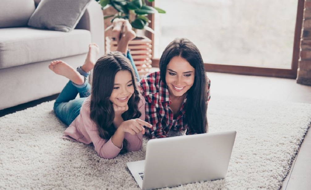 mother and daughter enjoying easy online shopping through a sales funnel
